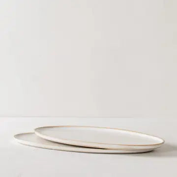 oval cream colored platter with natural rim