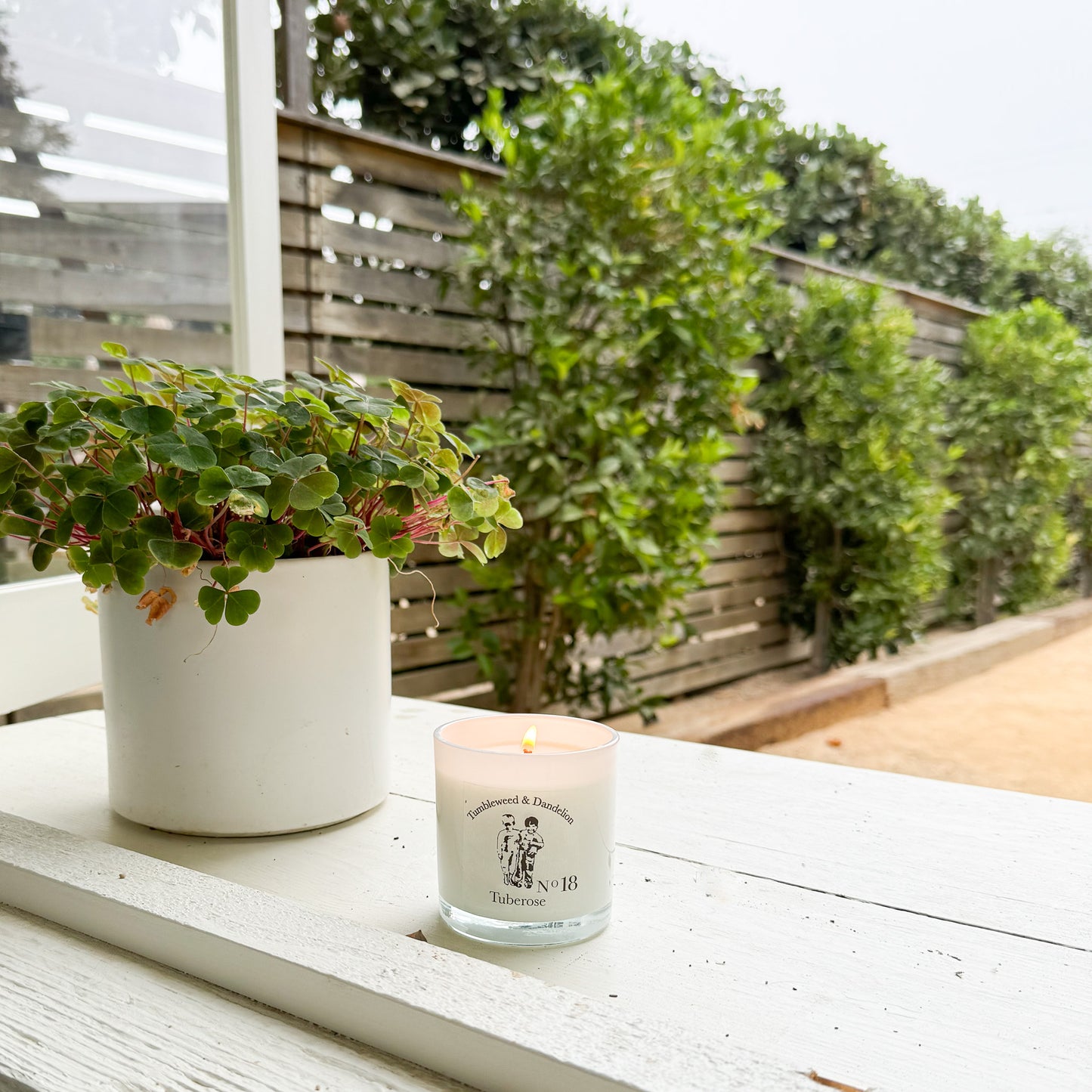 white glass candle