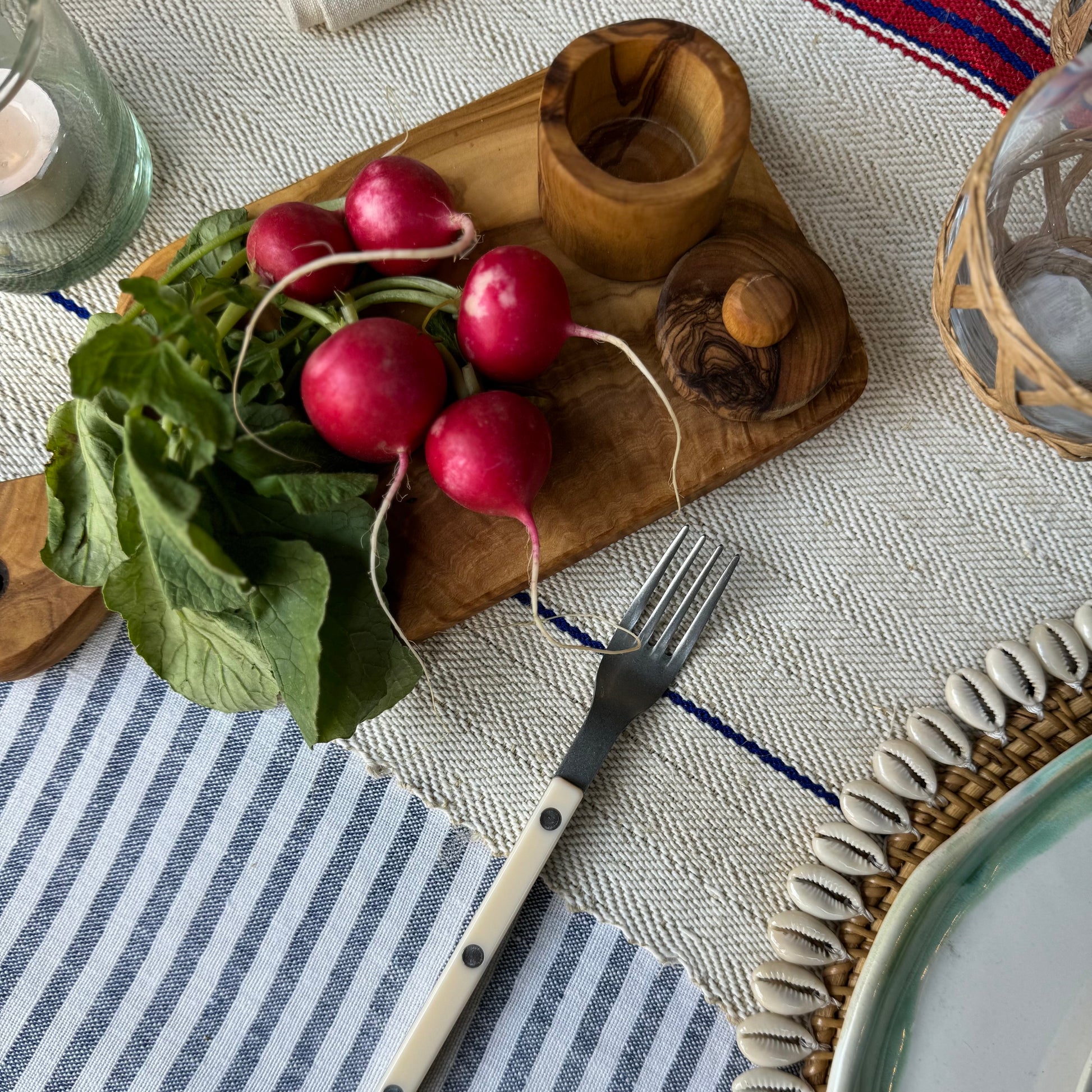 white  linen tablecloth with blue stripes