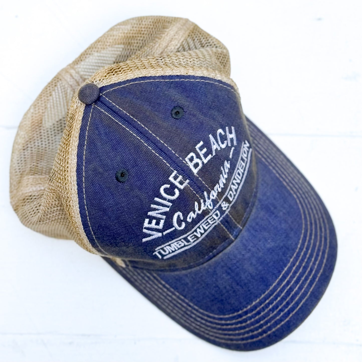 blue youth cap with tan back mesh and Venice Beach California Tumbleweed & Dandelion embroidered on front