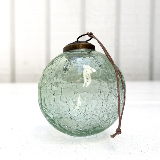 green crackle glass ornament ball with aged brass top