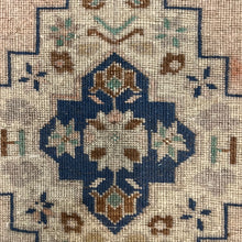 Load image into Gallery viewer, vintage area rug with navy, brown, tan and cream colored pattern