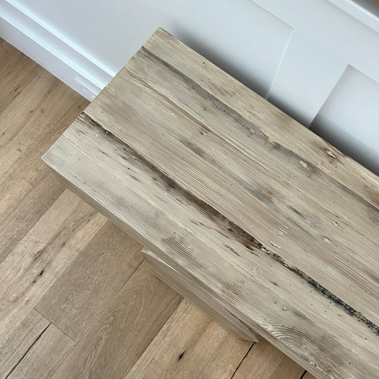 close up of old wood entry table