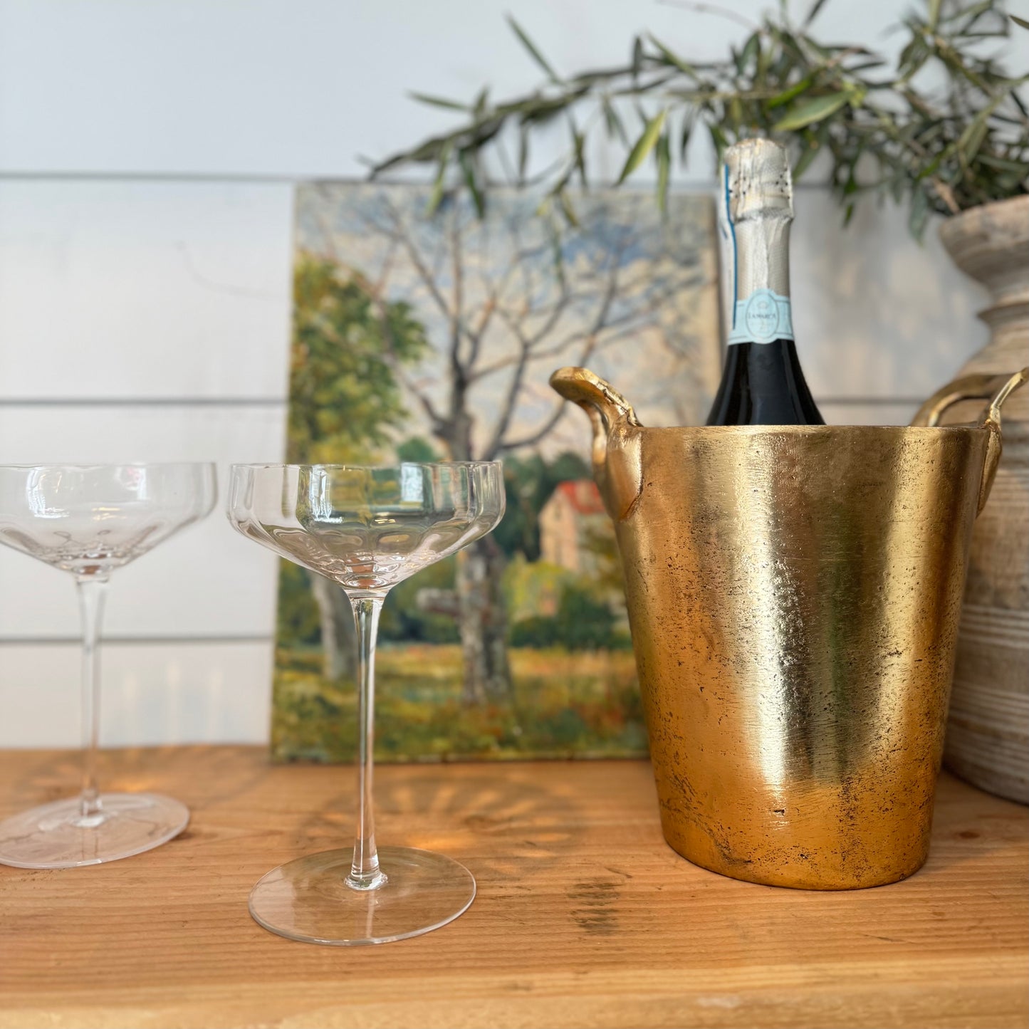 clear coupe shaped champagne glass with ridges