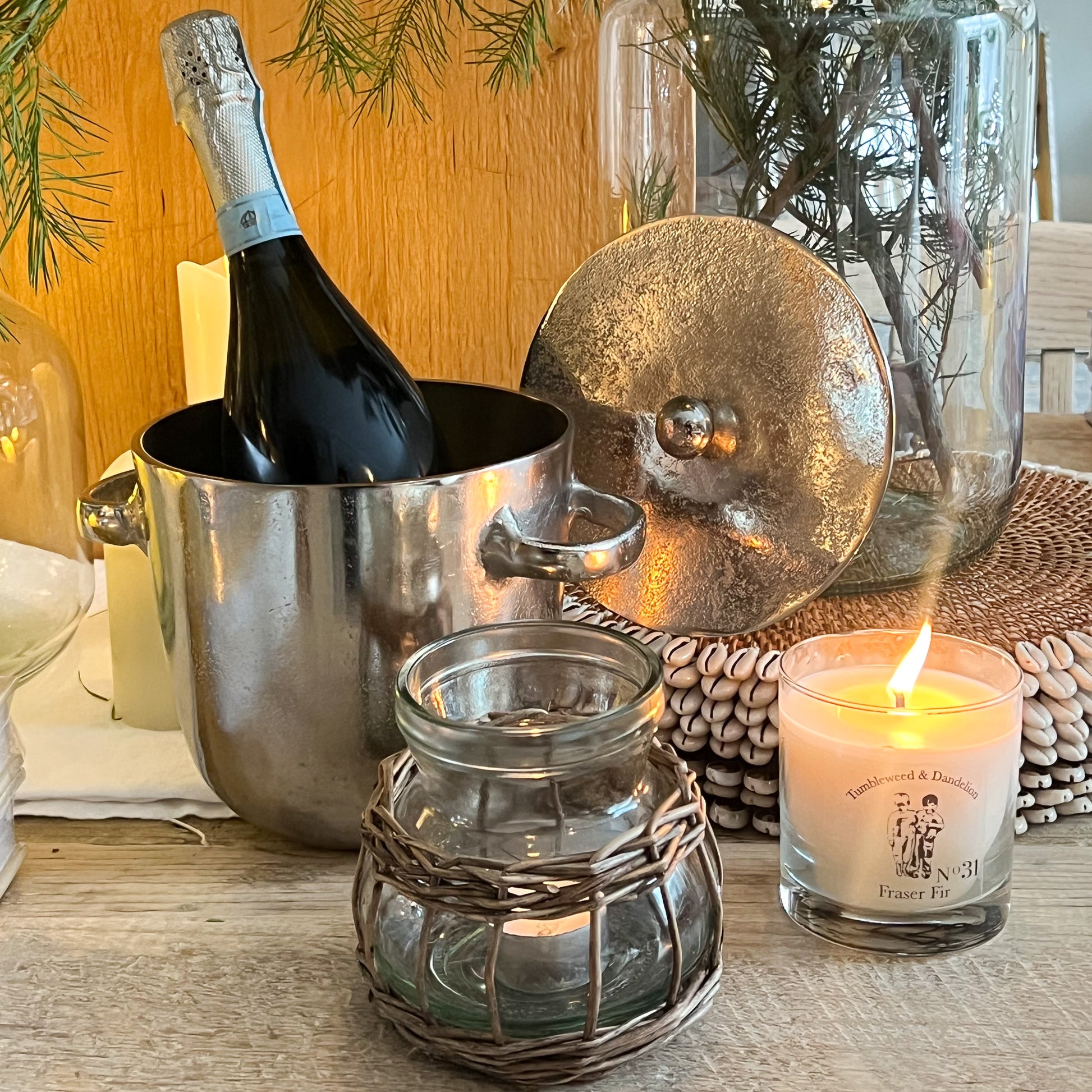 silver metal ice bucket with two handles and a lid