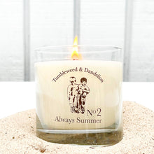 Load image into Gallery viewer, clear glass candle with Tumbleweed logo in blackALWAYS SUMMER clear candle with black Tumbleweed &amp; Dandelion logo