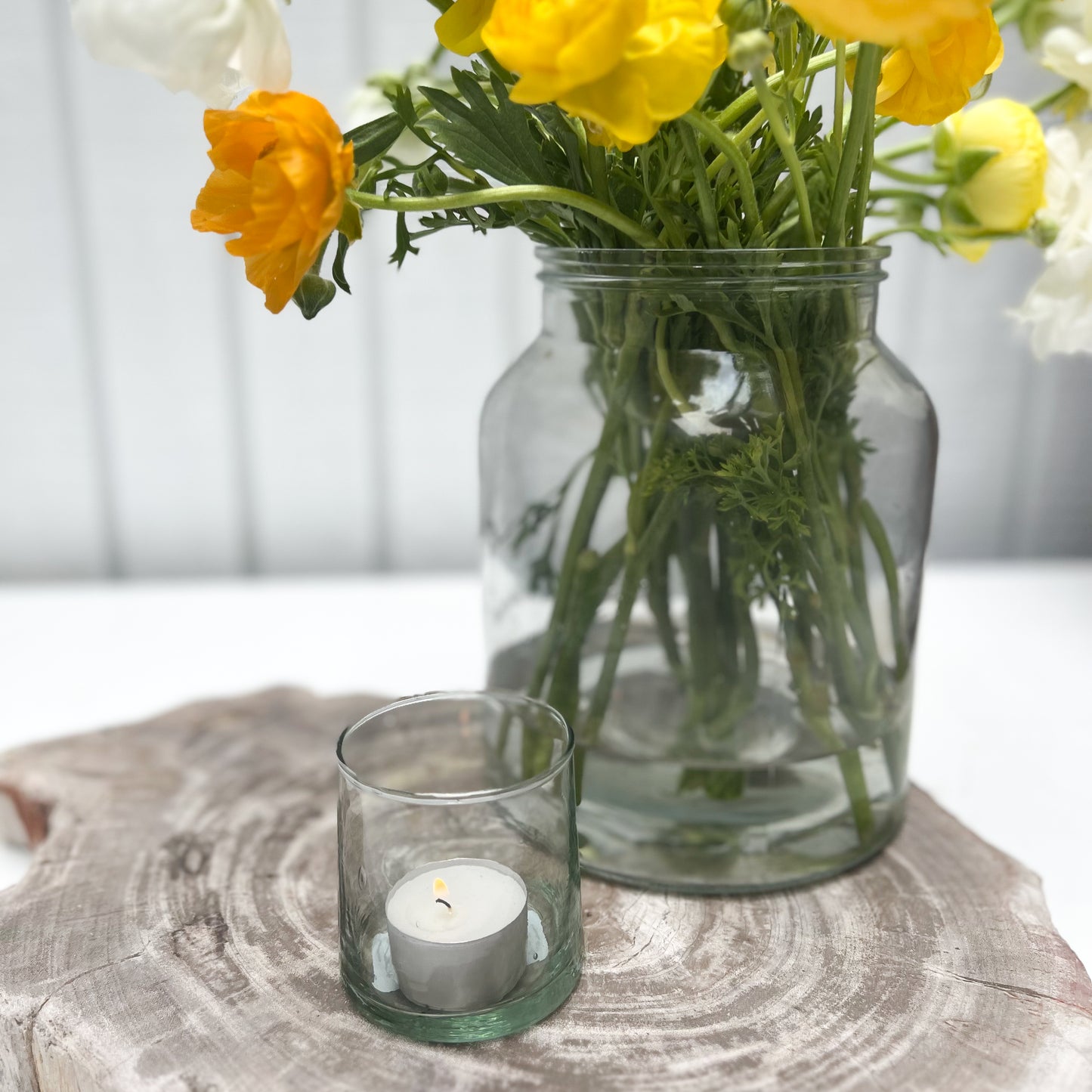 green tinted round glass candleholder