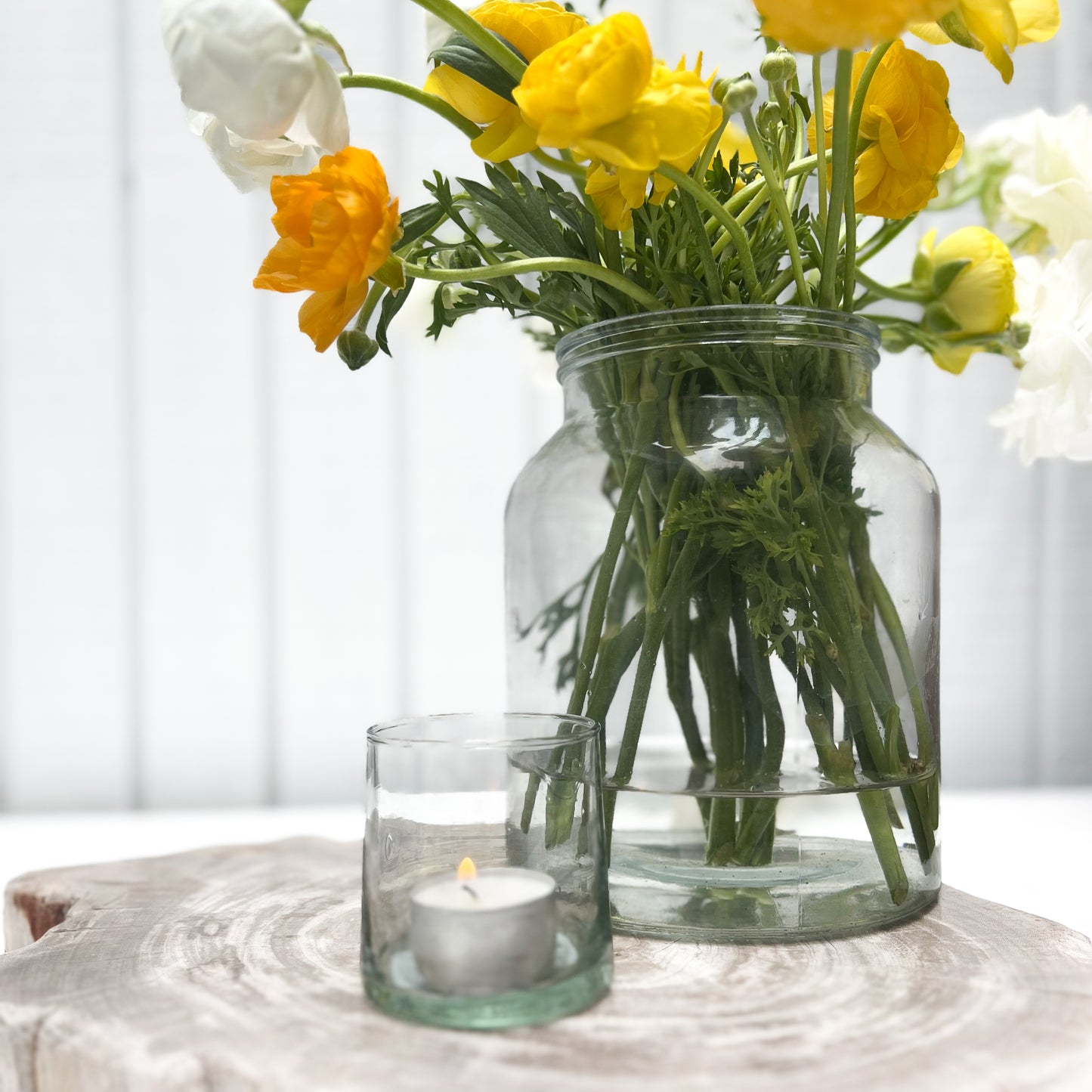 green tinted round glass candleholder