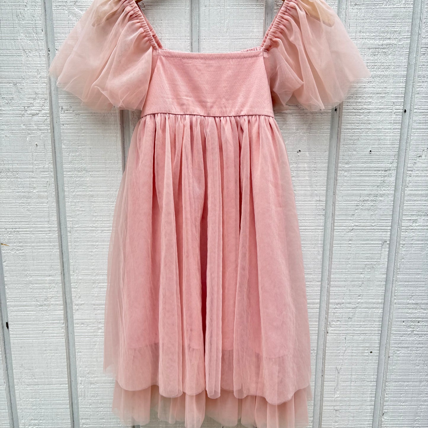 girl's pink dress with tool skirt and short sleeves