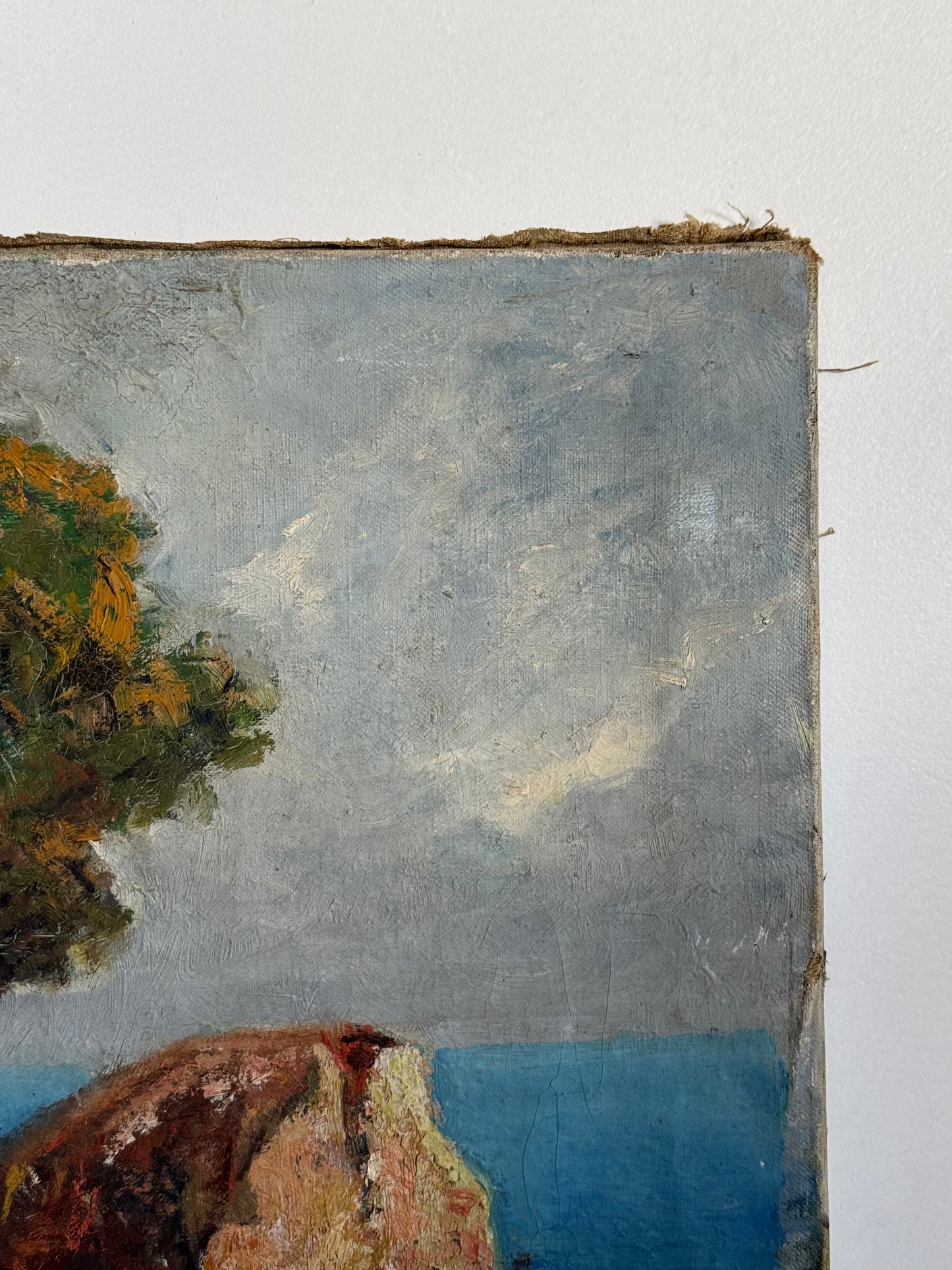 Section of a landscape painting with trees and sky on a white background