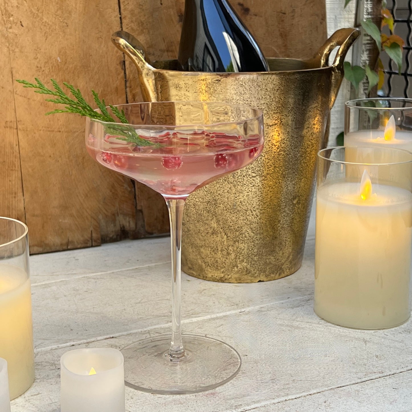 clear coupe shaped champagne glass with ridges
