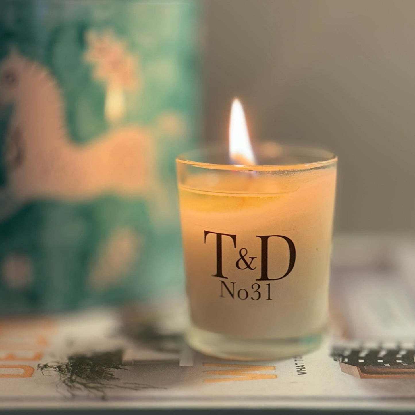 clear glass votive with clear label logo