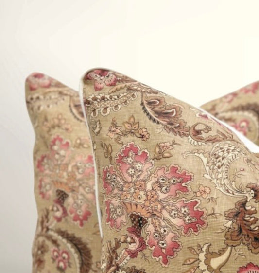 Close-up of decorative pillows with intricate patterns on a light background