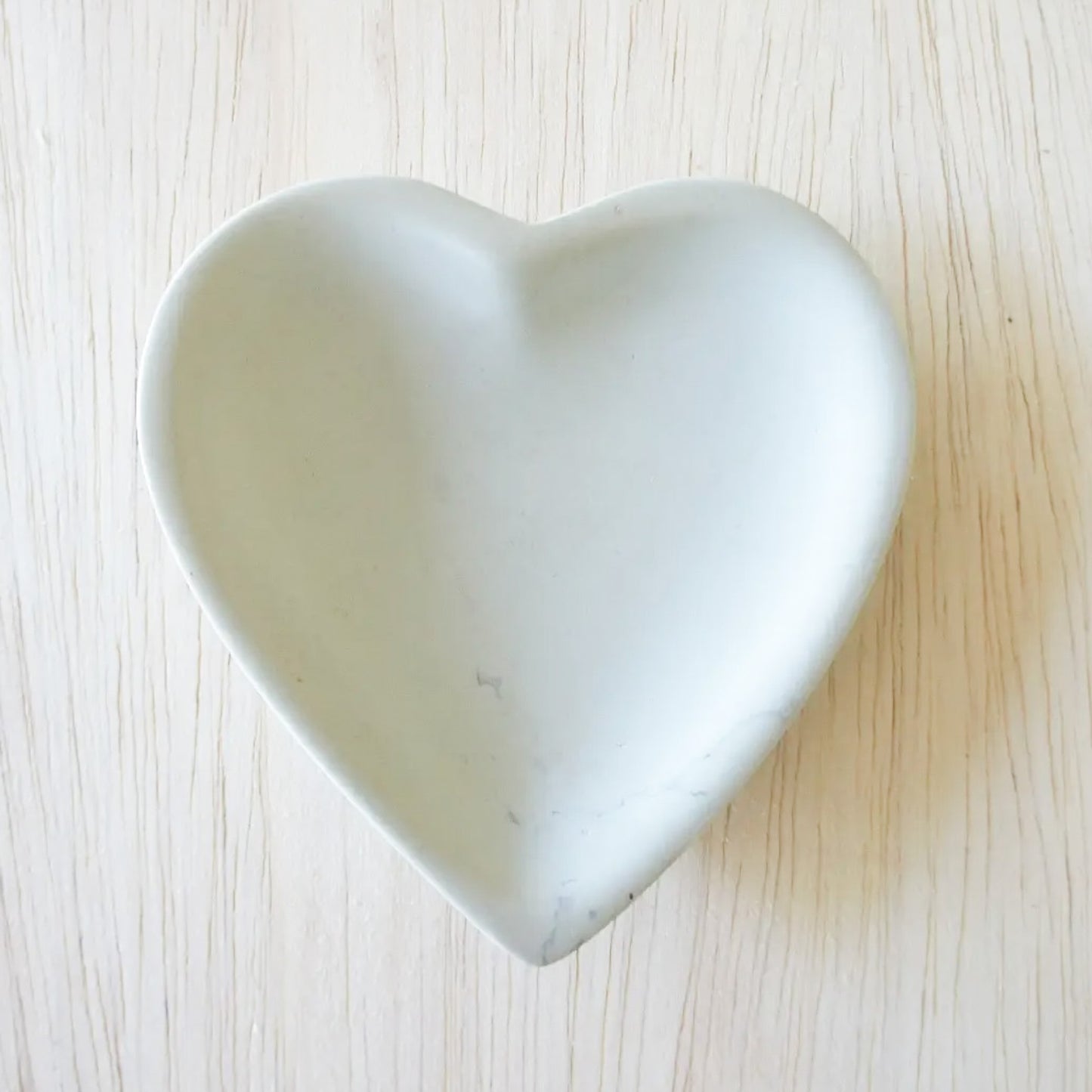 heart shaped white stone bowl