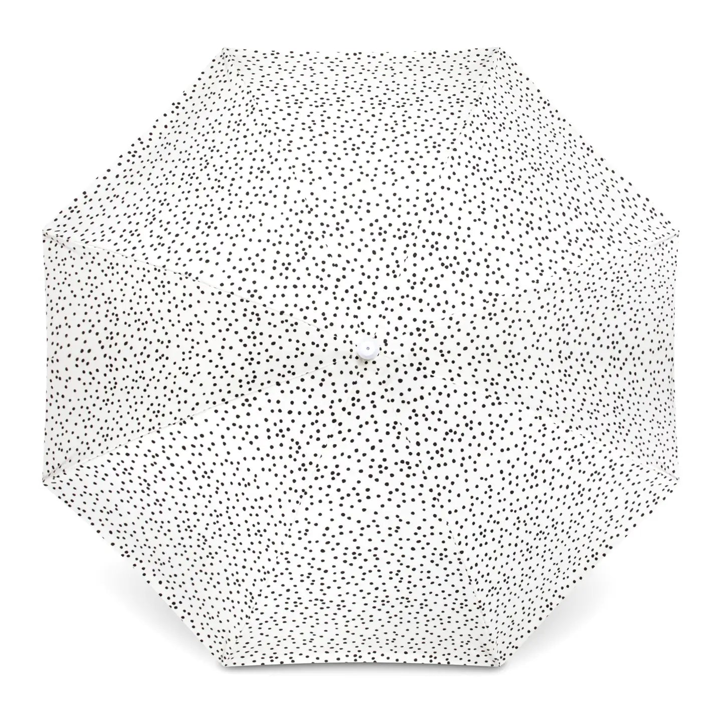 Hexagonal placemat with black dot pattern on a white background