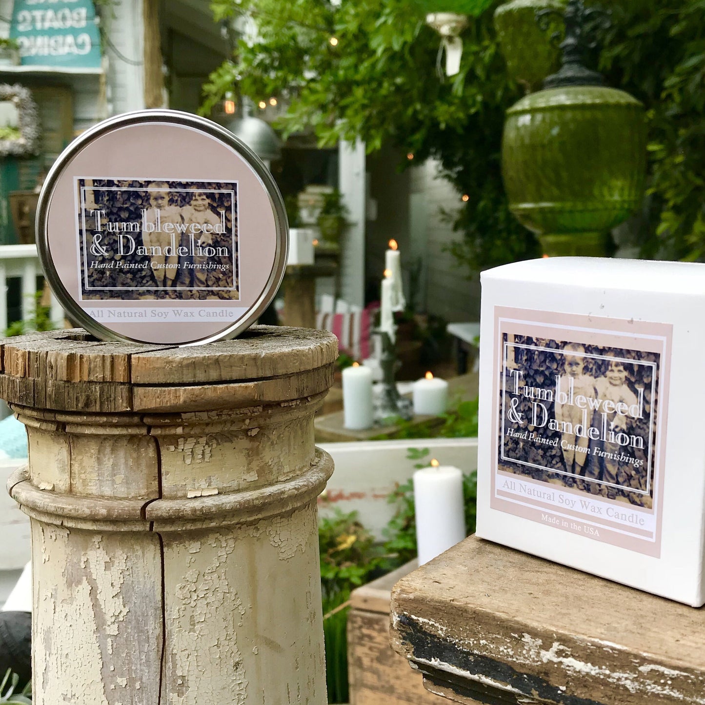 silver tin travel candle with logo on lid