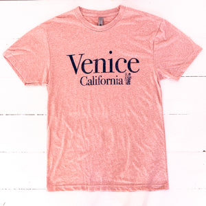 pink colored short sleeved tee shirt with Venice California on the front in dark brown