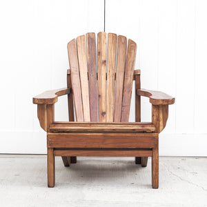 traditional Adirondack chair made of reclaimed Douglas fir with footrest