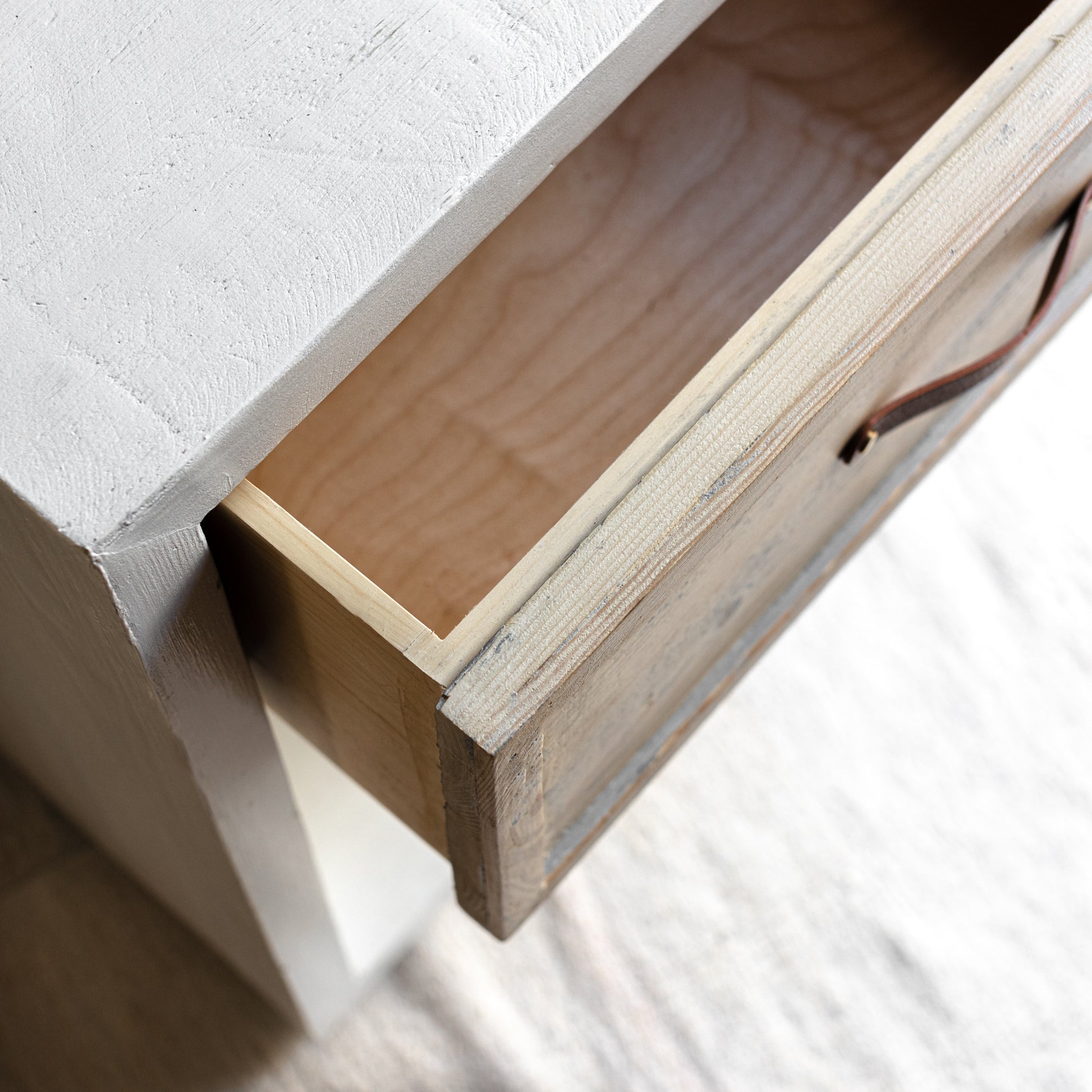 white and natural wood  cube nightstand with brown leather handle