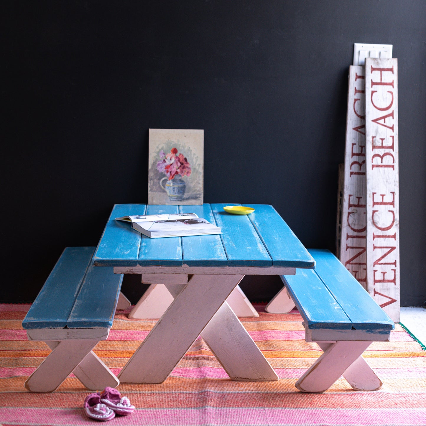 painted wood kids picnic table and benches with turquoise blue top and white bottom