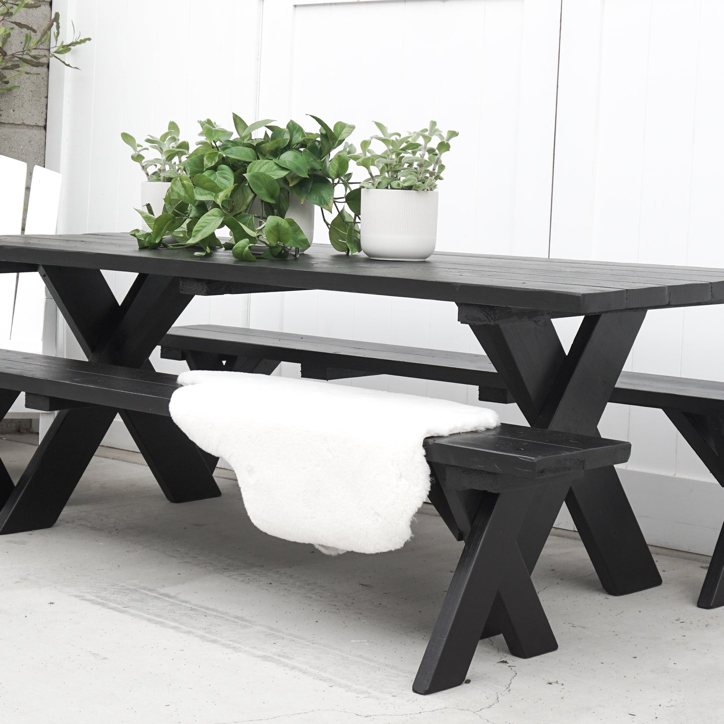black painted redwood picnic table and benches