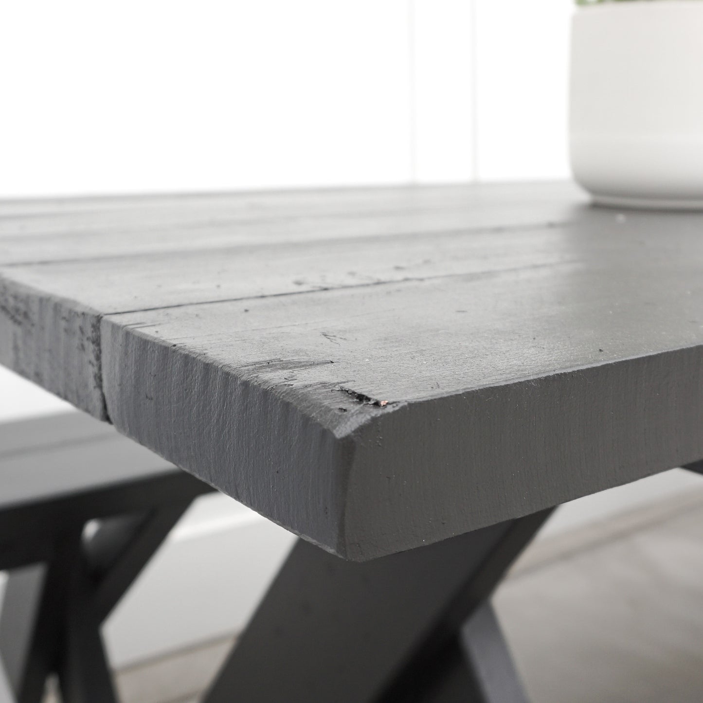 black painted redwood picnic table and benches