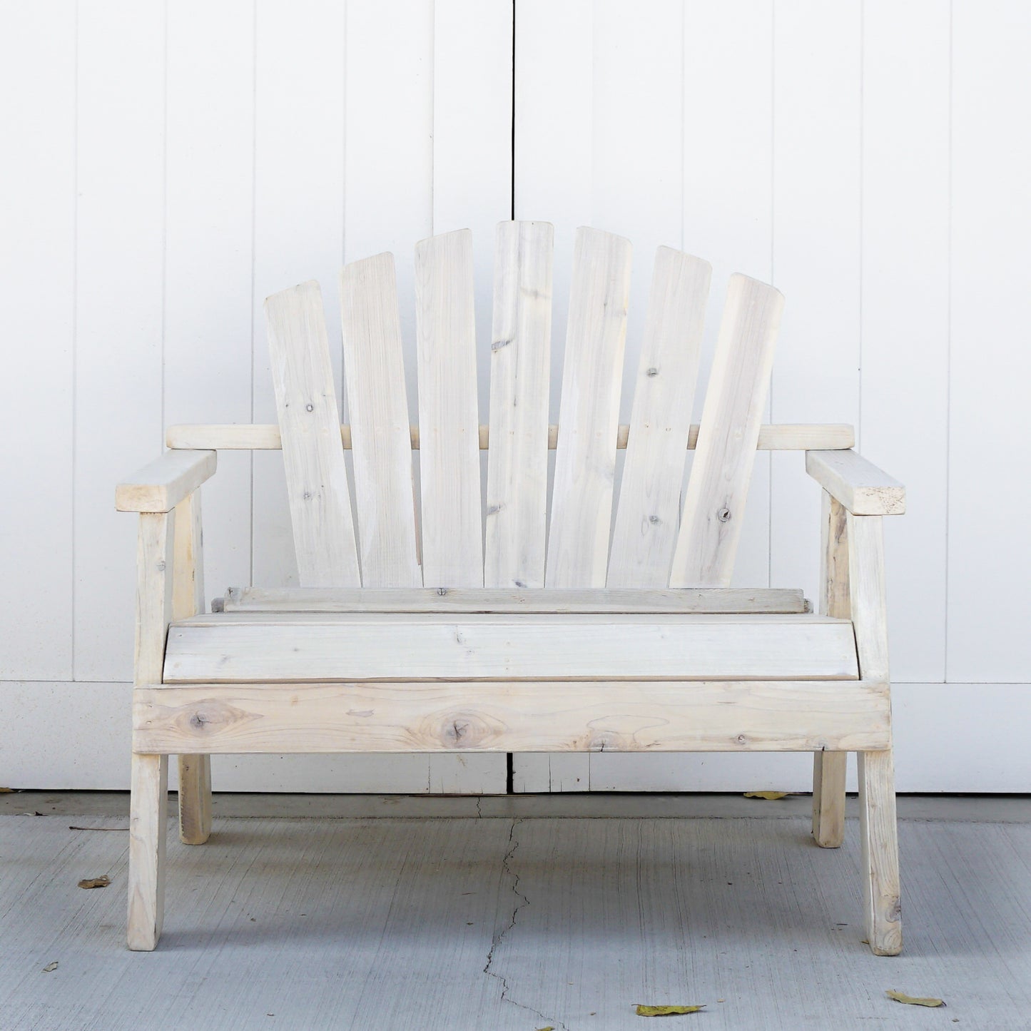 white washed wood patio loveseat