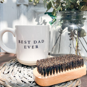 off white stoneware mug with black letters that say "Best Dad Ever"