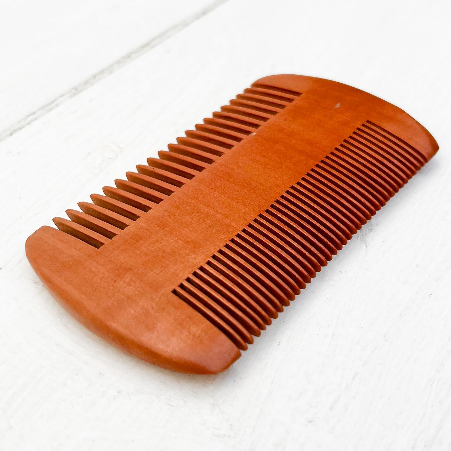 two sided light brown pear wood beard comb