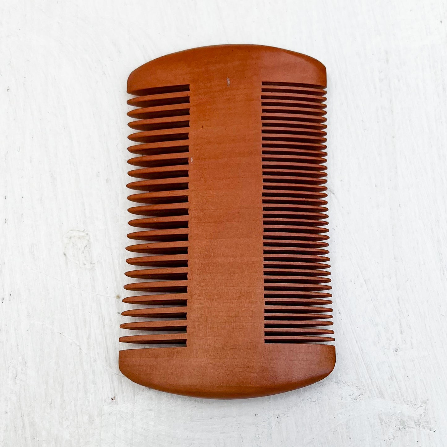 two sided light brown pear wood beard comb