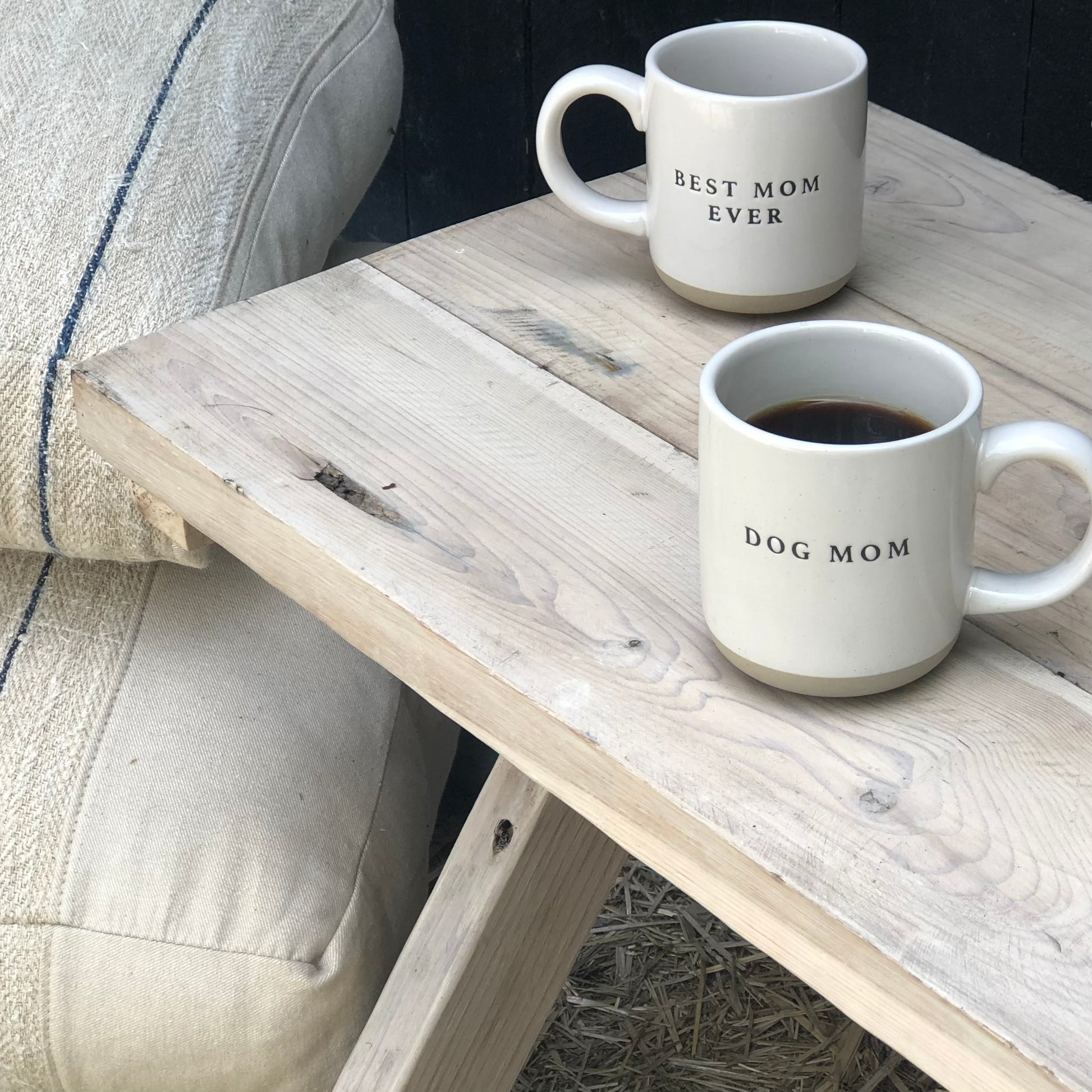 off white stoneware mug with words "dog mom" in black letters