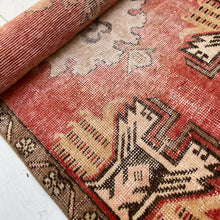 Load image into Gallery viewer, red, tan and brown patterned small Turkish rug