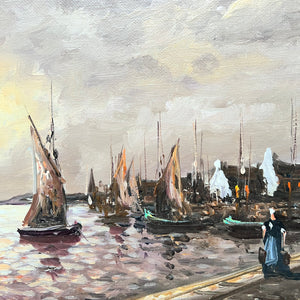 impressionistic painting of sailboats at a port and woman in foreground with blue dress, brown wood frame