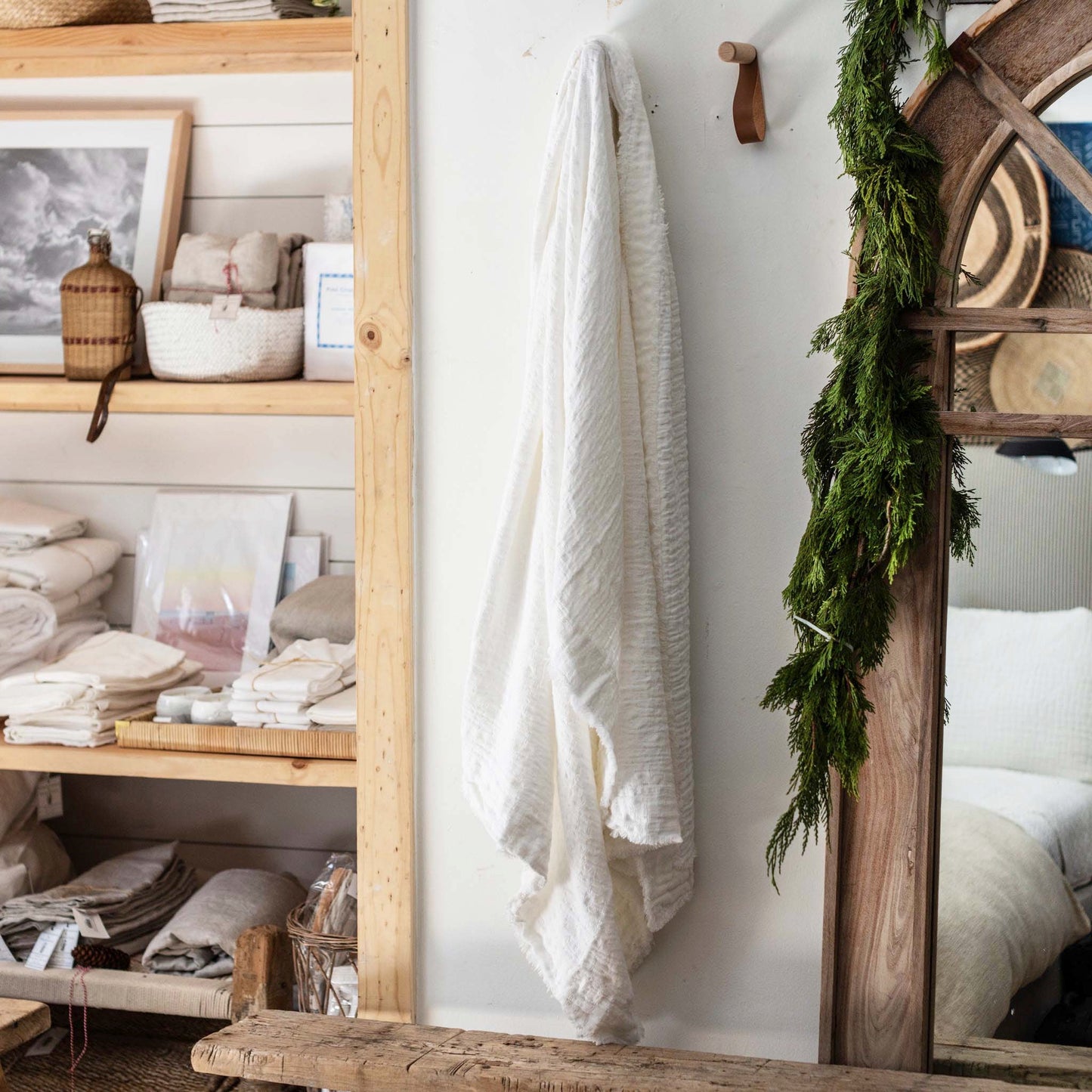 white cotton throw blanket with raw linen edging