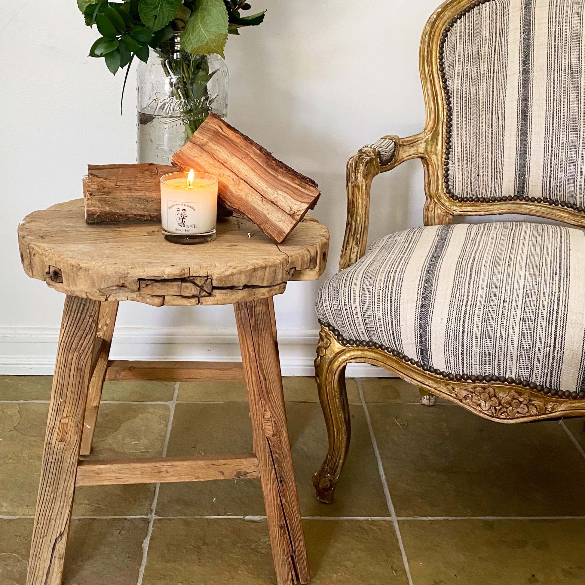 Fraser Fir scented clear glass candle with black logo