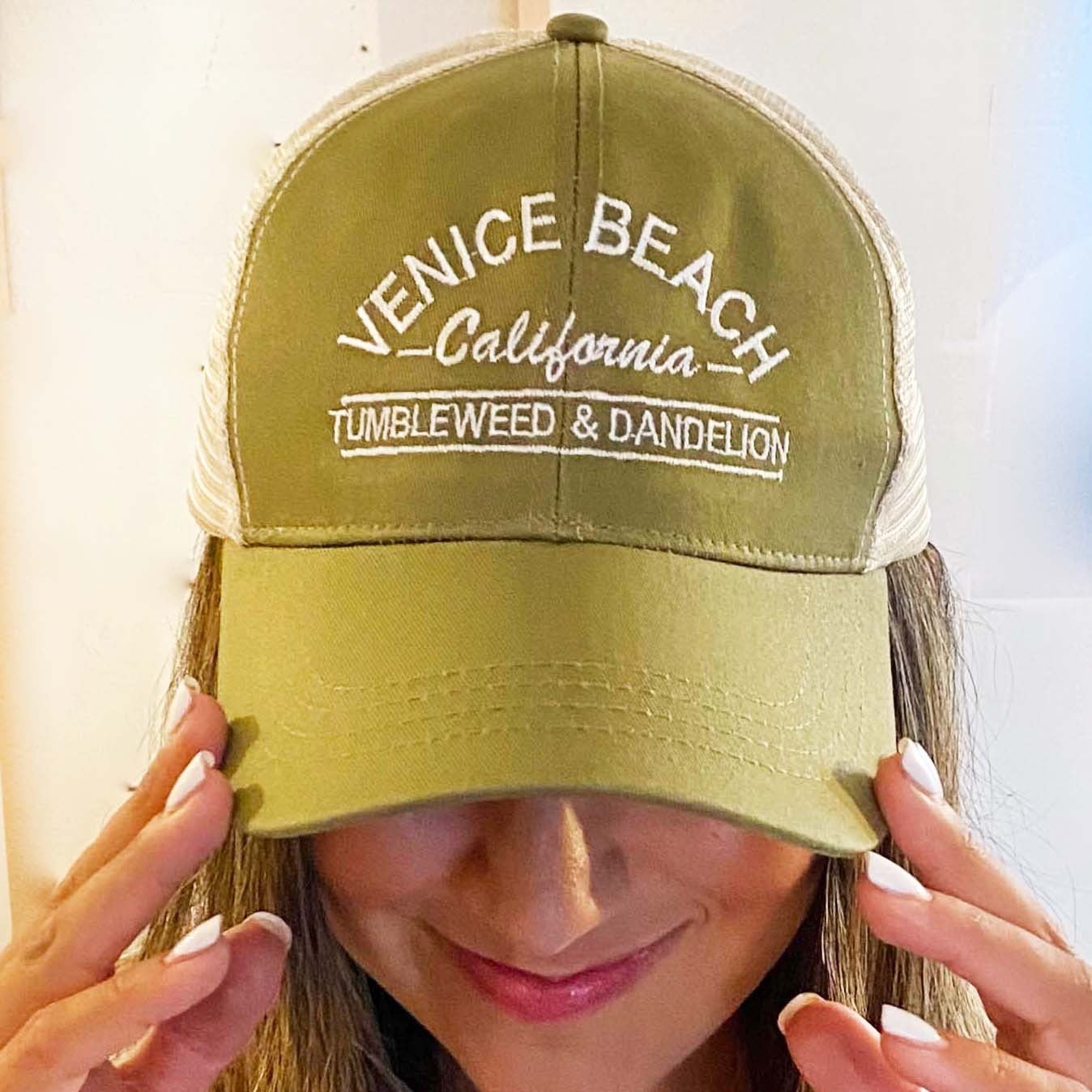 olive green and tan trucker cap with adjustable strap