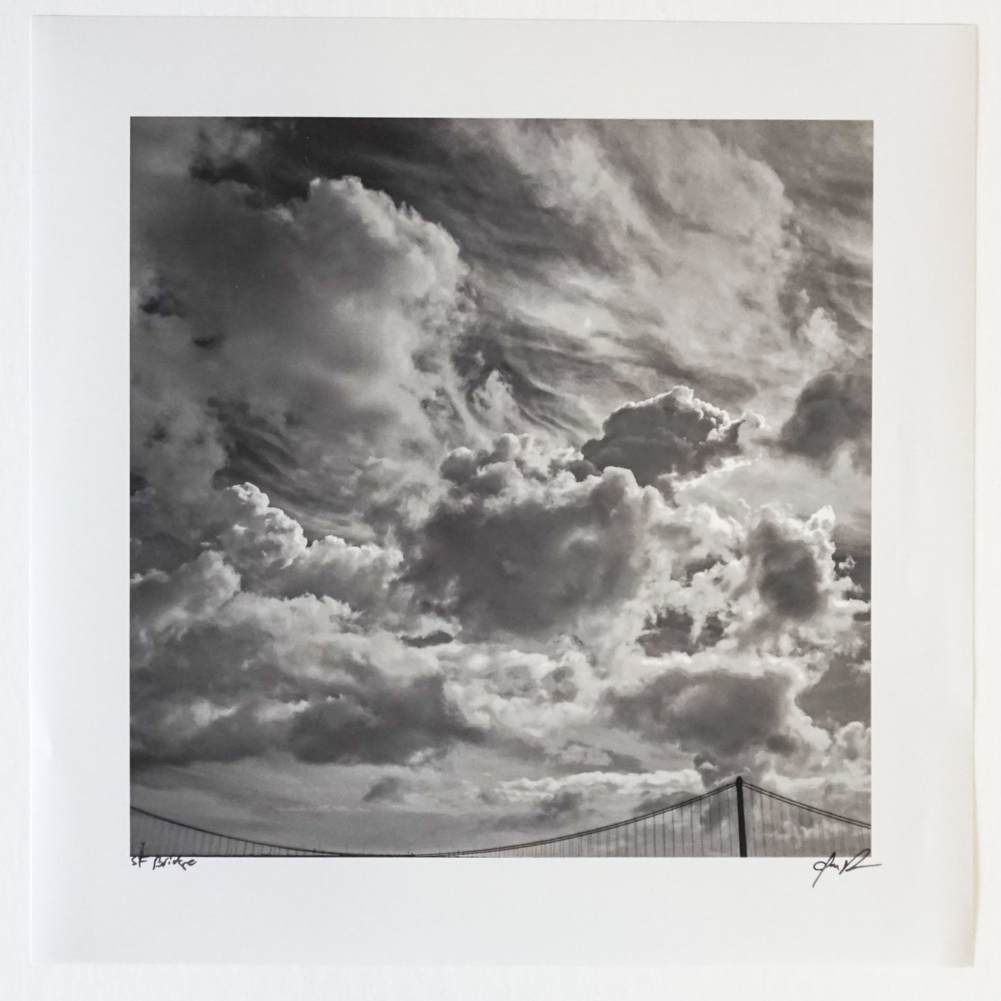 storm clouds with top of bridge