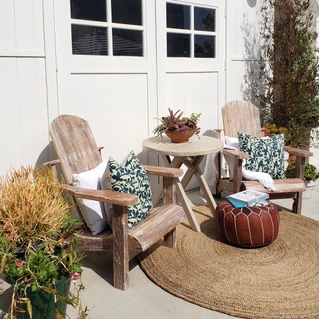 wood outdoor chairs aged with small areas of white paint