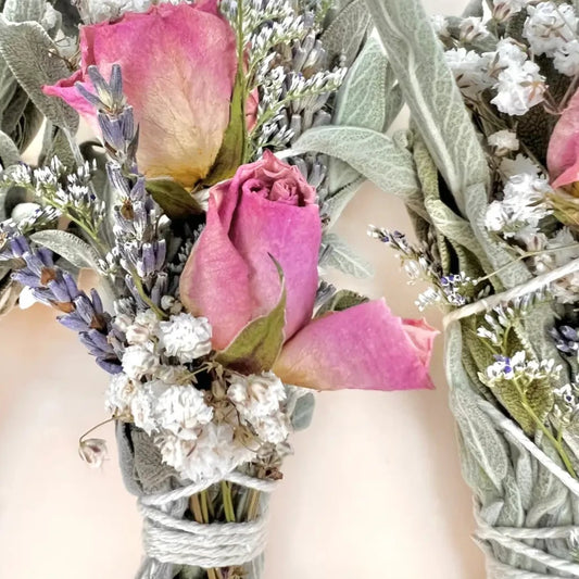 sage bundle with dried roses and other flowers