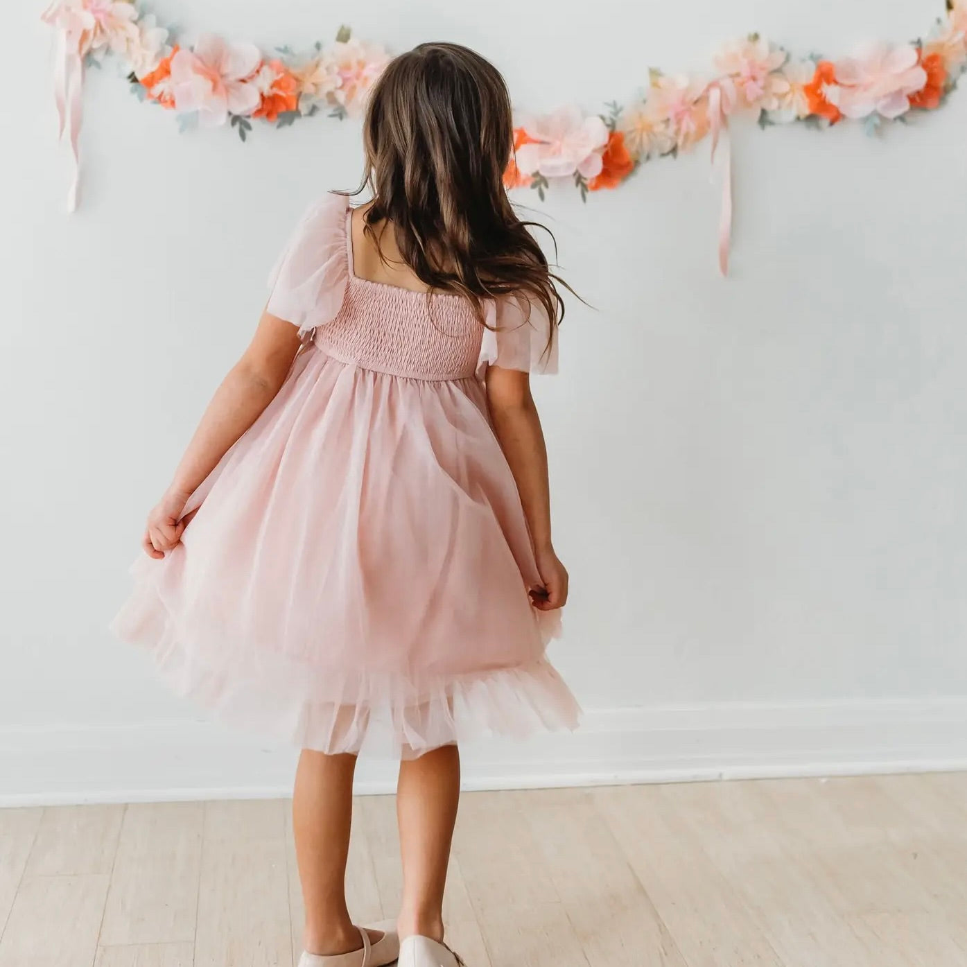 girl's pink dress with tool skirt and short sleeves