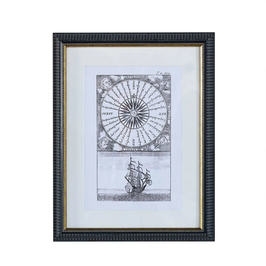 A picture frame with a black and gold texture, containing a vintage print of an explorer's journal drawings, including a compass and a ship.