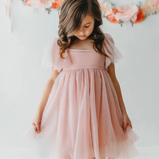 girl's pink dress with tool skirt and short sleeves
