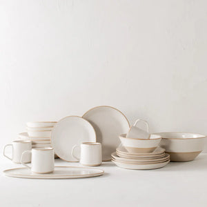 cream colored dishes with natural rim