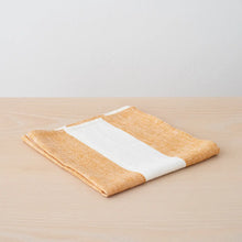Load image into Gallery viewer, Folded fabric with a white stripe on a wooden surface