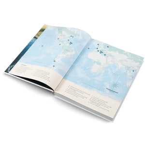 Open book with a map of the world on a white background