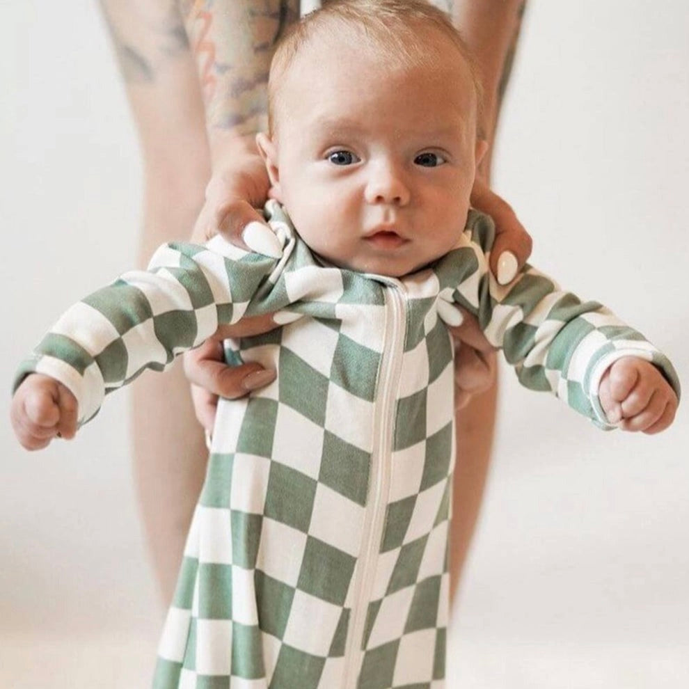 green and white check zip up baby pajamas