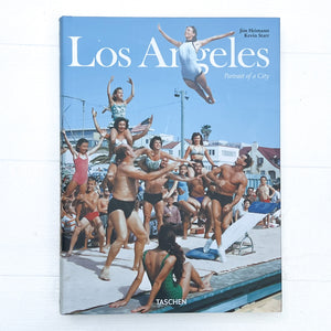 cover of book called "Los Angeles-portrait of a City", with a photo from the 1950's of a group of people at the beach practicing acrobatics 