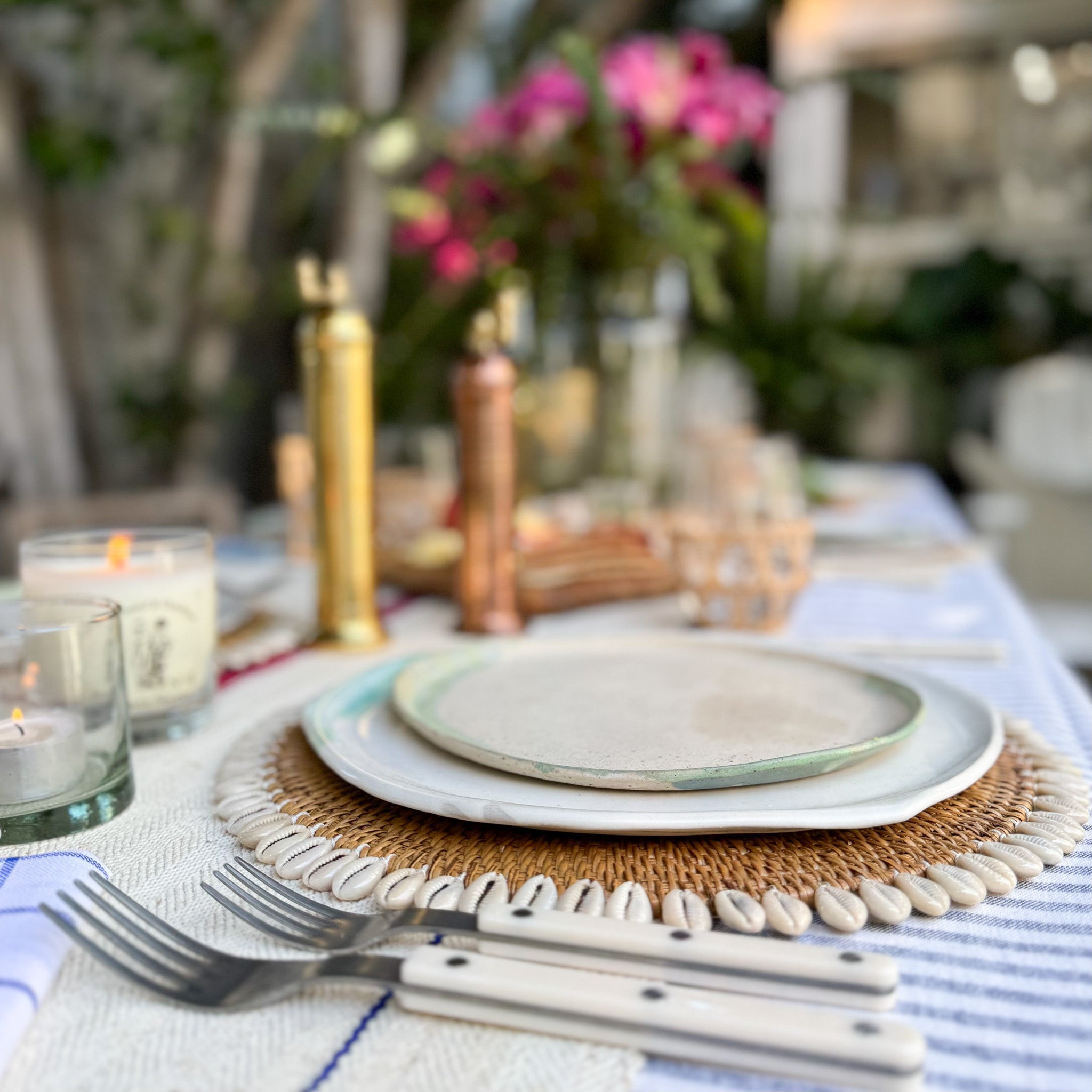 white ceramic dinner and salad plates with green glaze accents