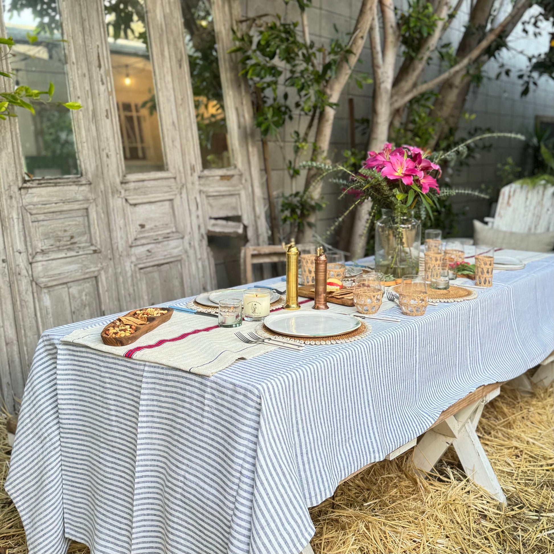white  linen tablecloth with blue stripes