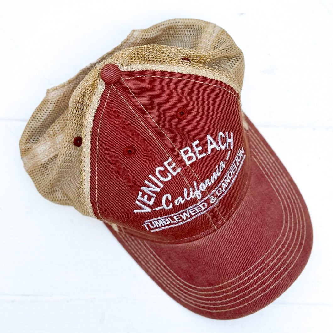 red youth cap with tan back mesh and Venice Beach California Tumbleweed & Dandelion embroidered on front